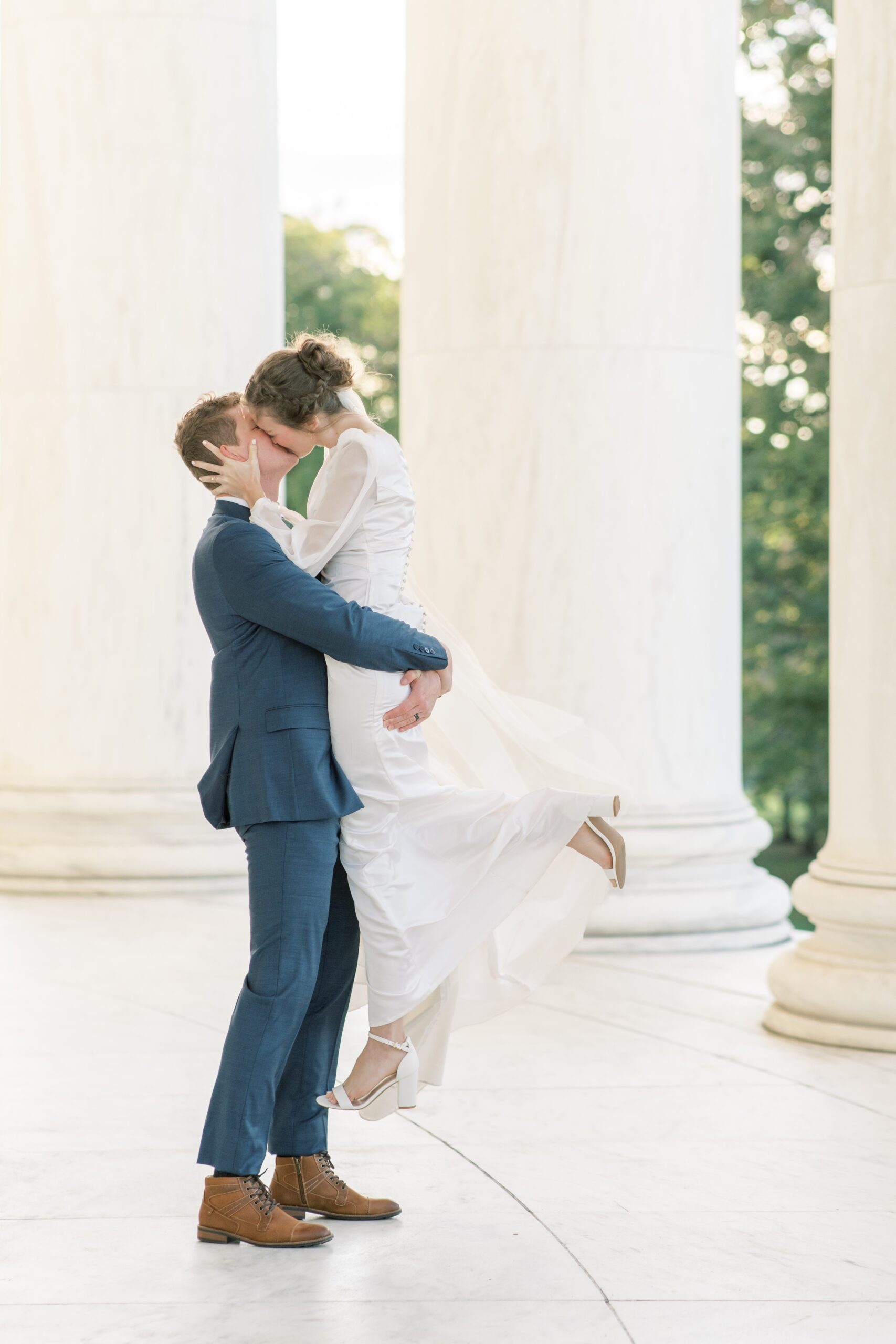 Timeless fall wedding portraits at the Jefferson Memorial in Washington, DC.