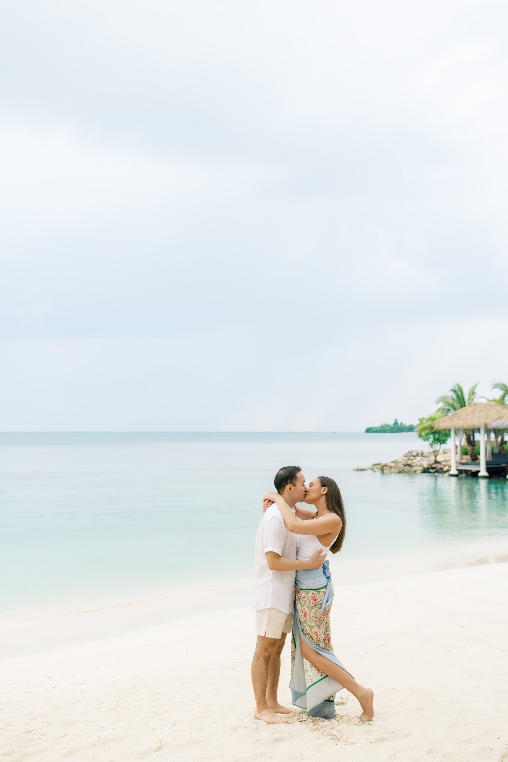 A beach front Caribbean engagement session held at Sandals Resort in Negril, Jamaica.