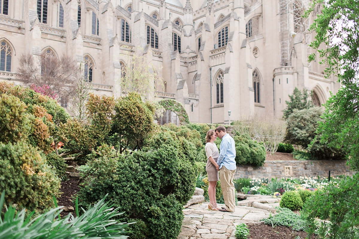 A beautiful sunrise engagement session during the peak of spring flowers at the Washington National Cathedral in Georgetown, DC.