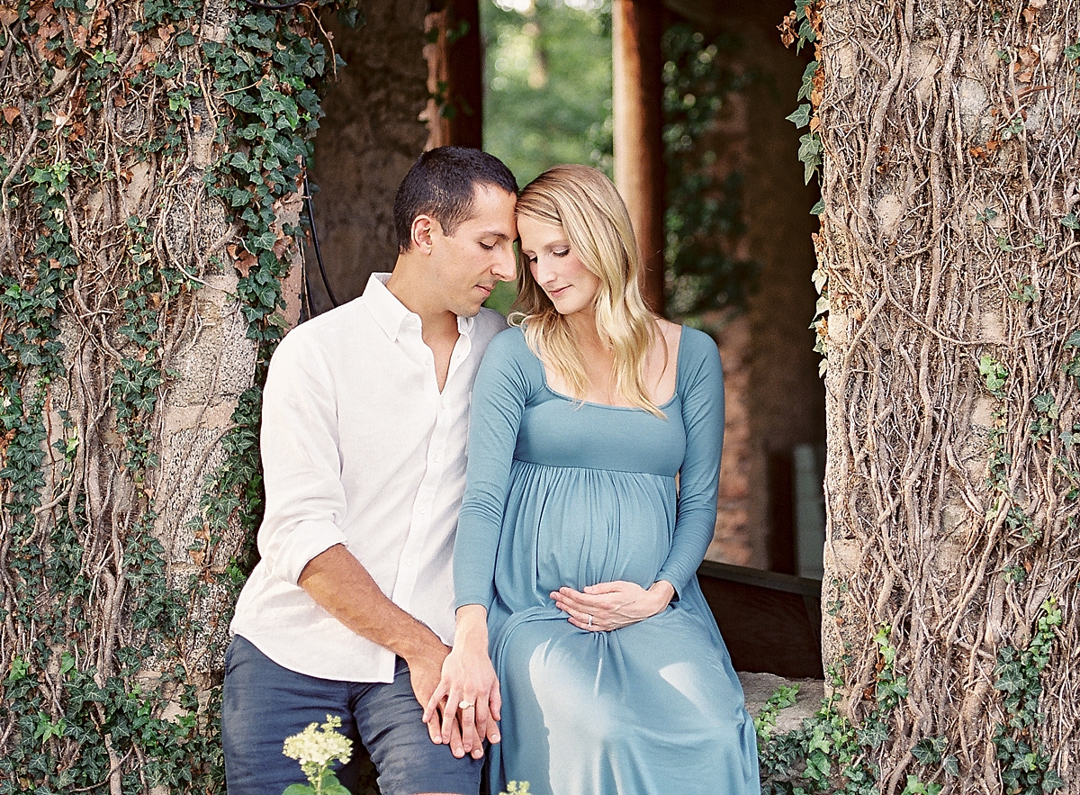 A chic and classic maternity session captured on film at Goodstone Inn in Middleburg, VA.