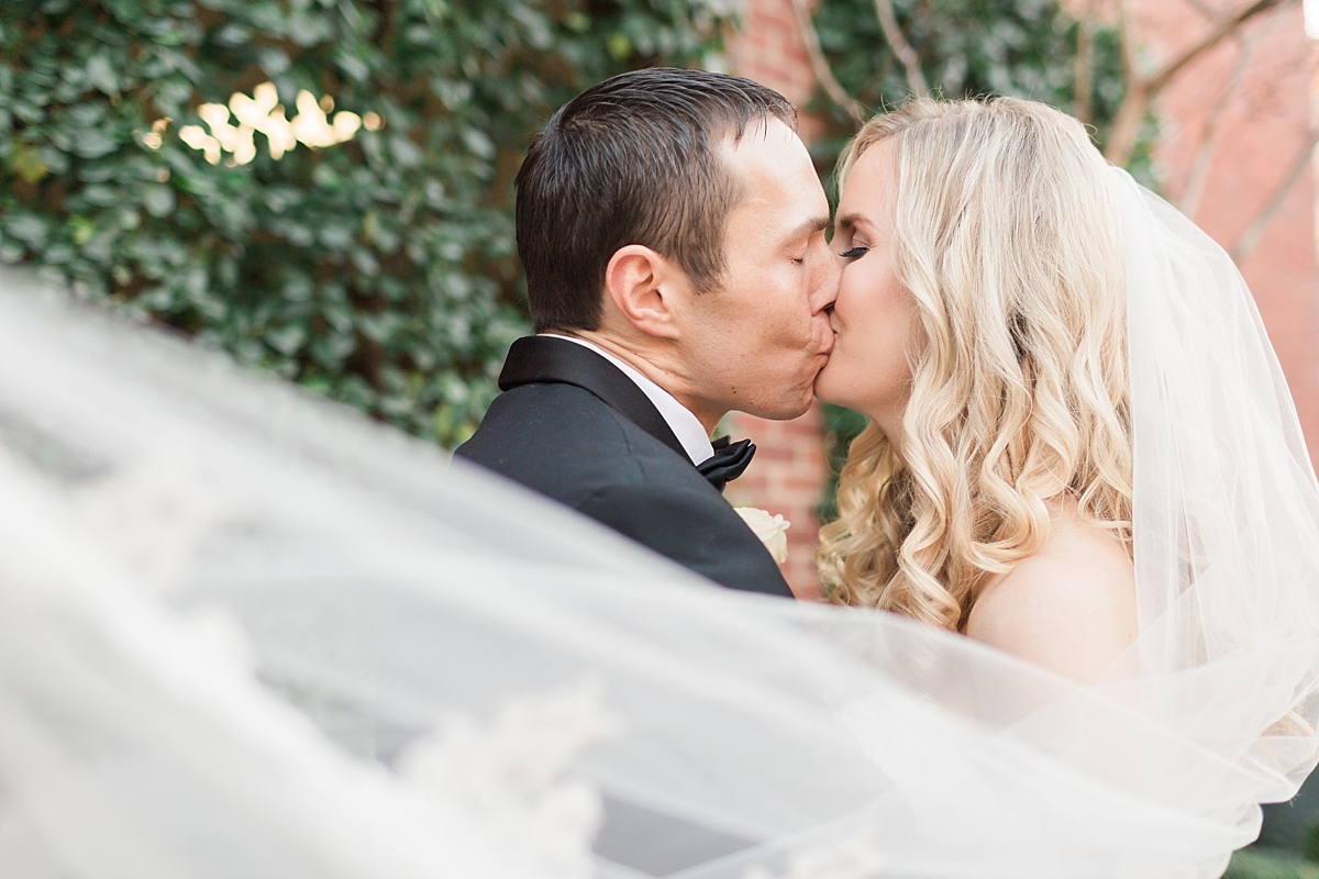 A stunning gold, champagne, and crimson winter wedding in Old Town Alexandria, VA at the classic Hotel Monaco.