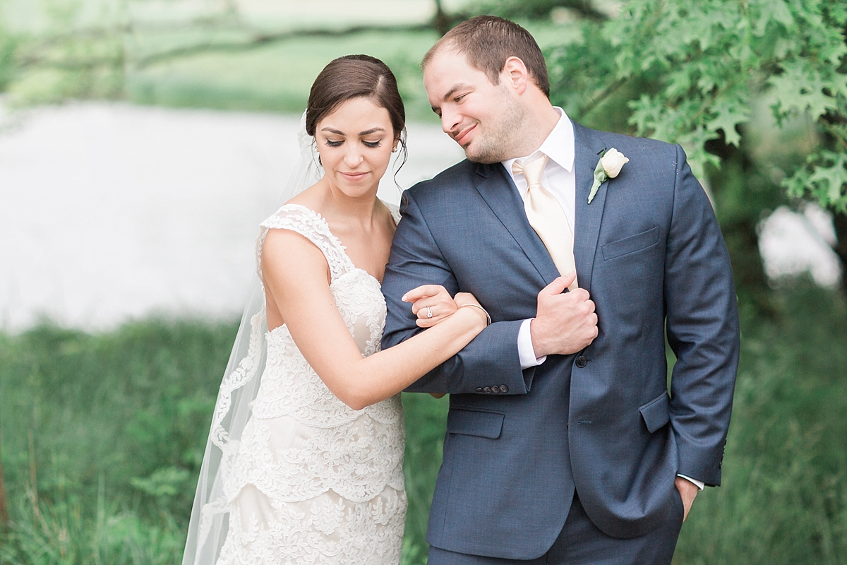 A little rain doesn't stop this Washington, DC wedding photographer from getting gorgeous portraits on Gaby & Tino's wedding day in Haymarket, Virginia!