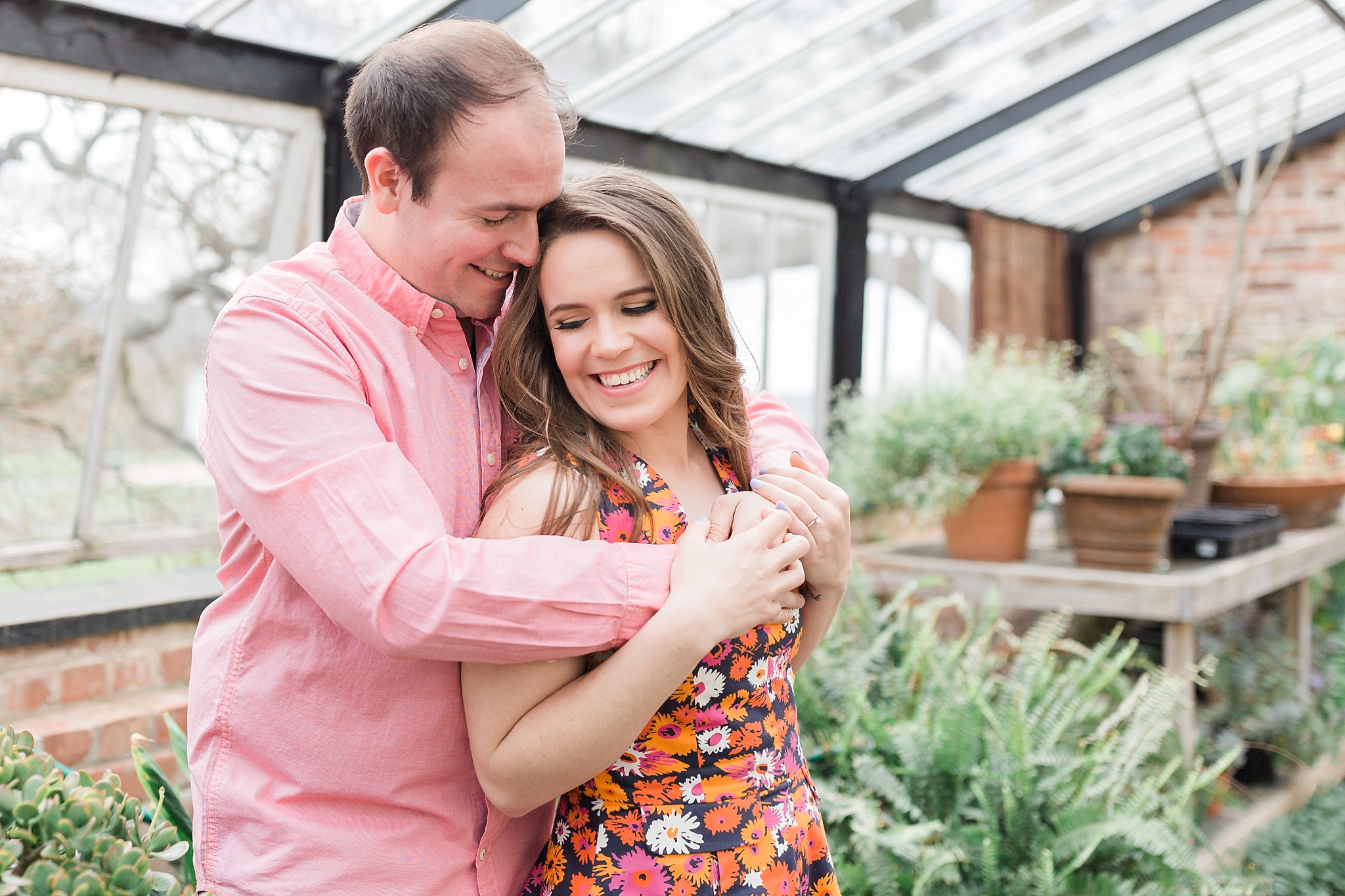 A lovely engagement session in the gardens of Oatlands Plantation Home in Leesburg, VA is captured by Washington, DC wedding photographer, Alicia Lacey.