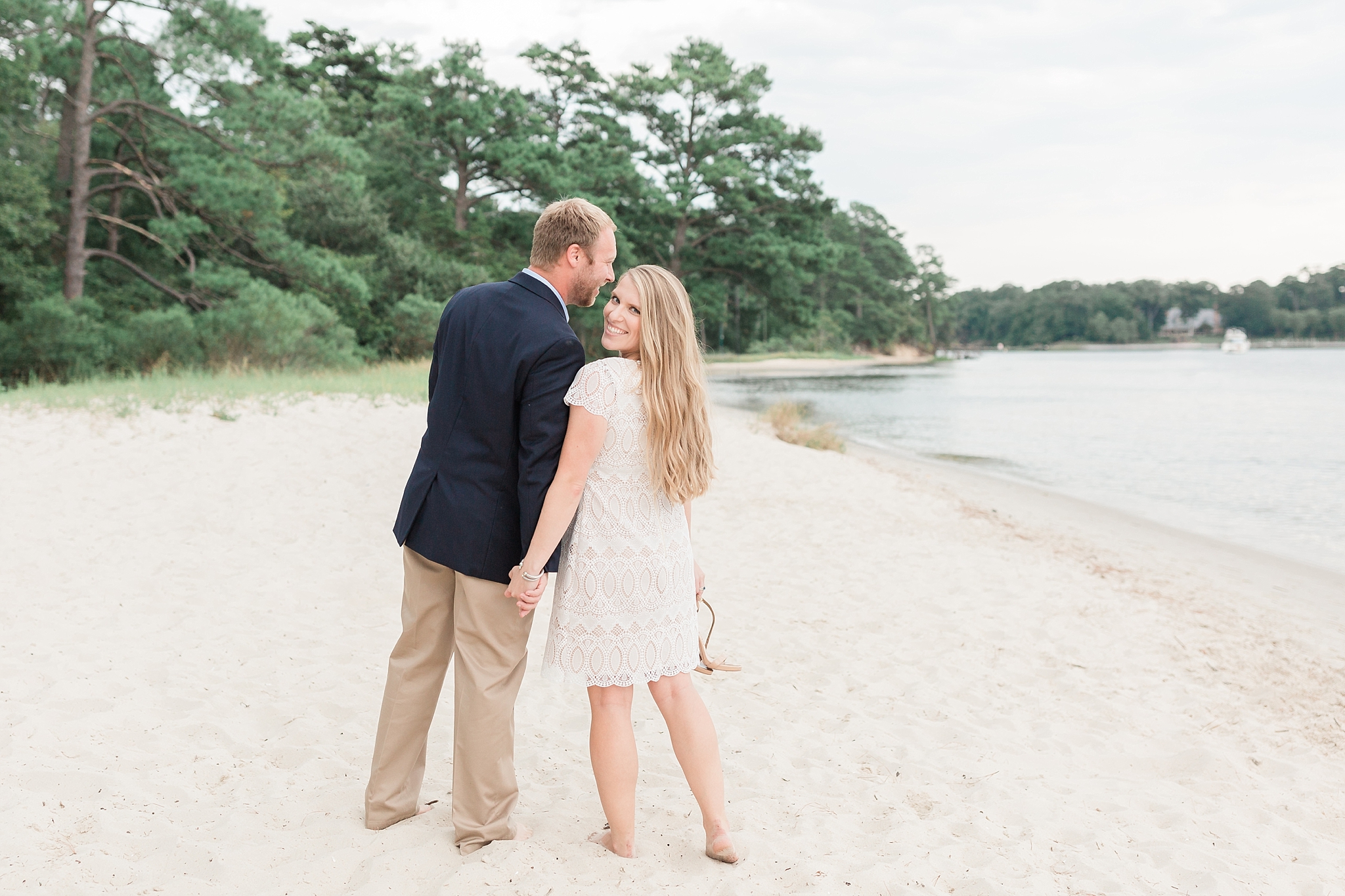 A stylish engagement session is held in the iconic spanish moss and beachfront of First Landing State Park in Virginia.