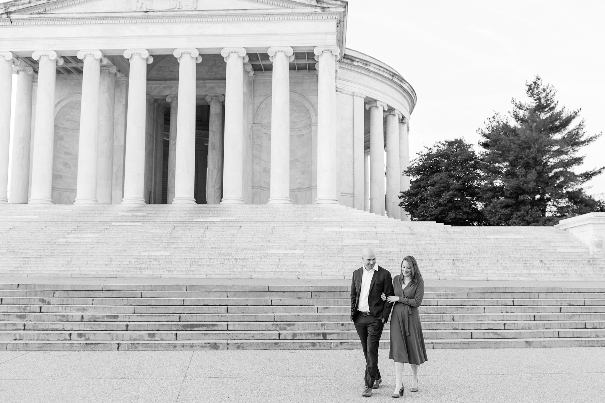 A romantic sunrise engagement session at the iconic Jefferson Memorial in Washington, DC.