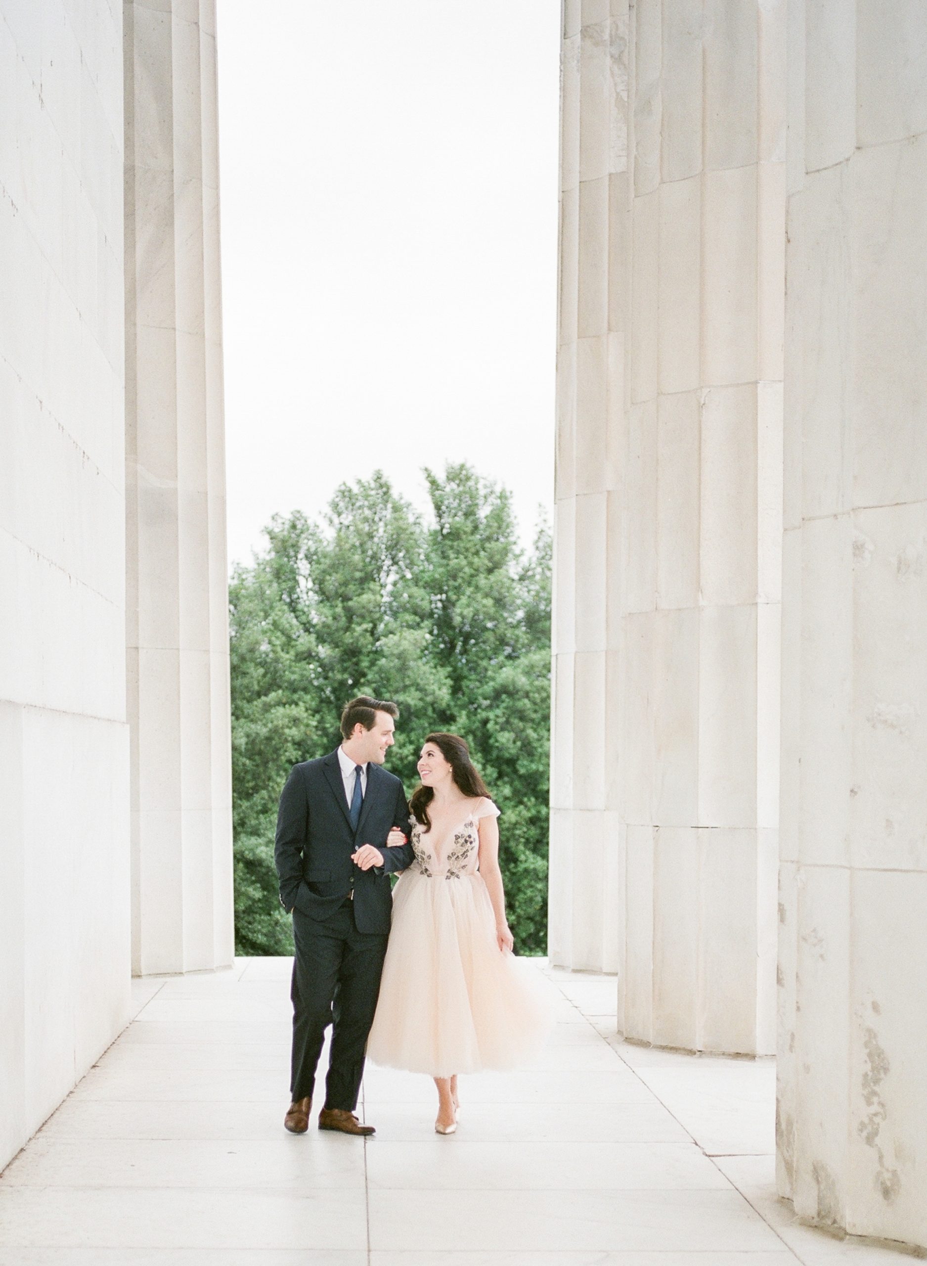A chic sunrise engagement session at the Lincoln Memorial in Washington DC. Photographed by fine art film photographer, Alicia Lacey.