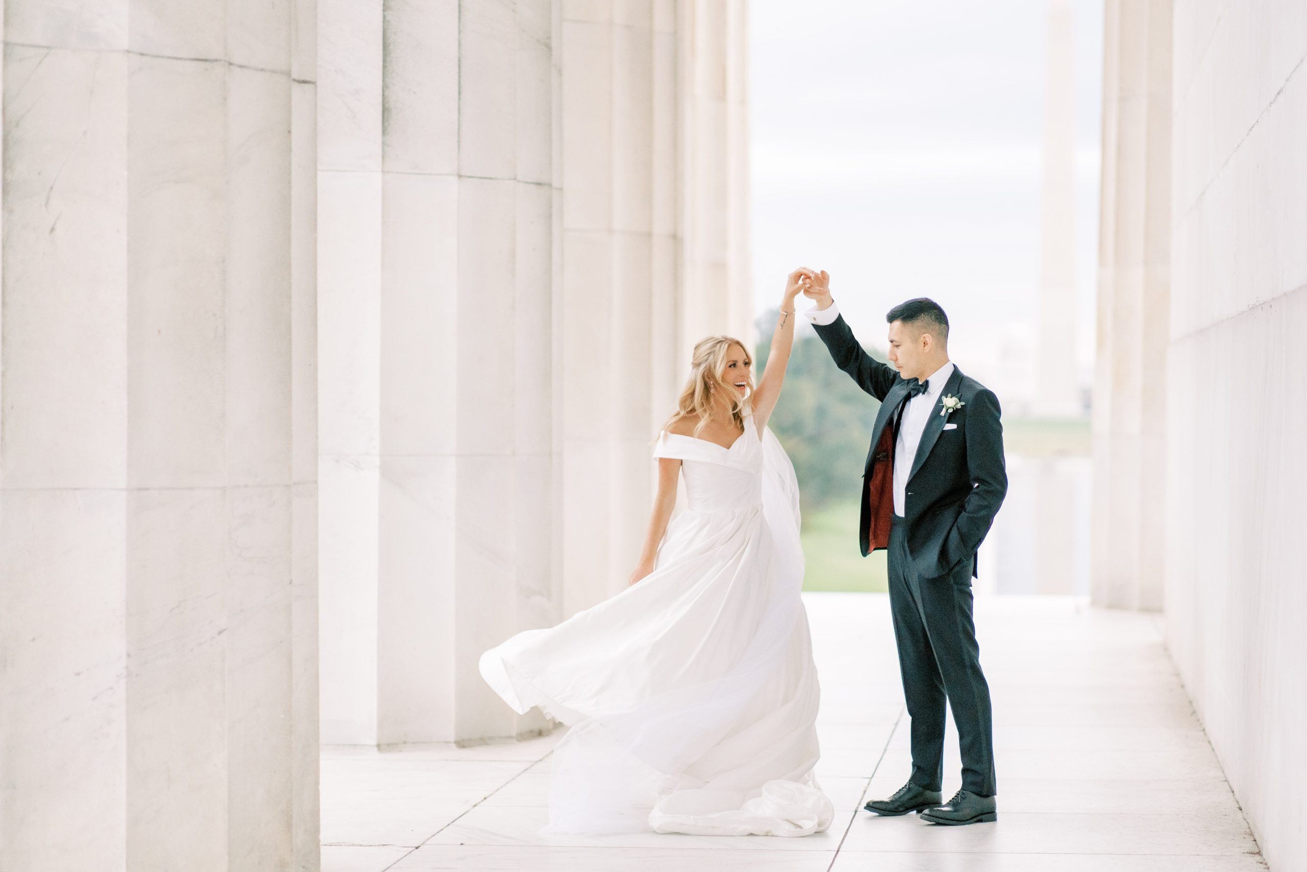 An intimate fall elopement ceremony at the DC War Memorial, followed by portraits at the Lincoln Memorial in Washington, DC.