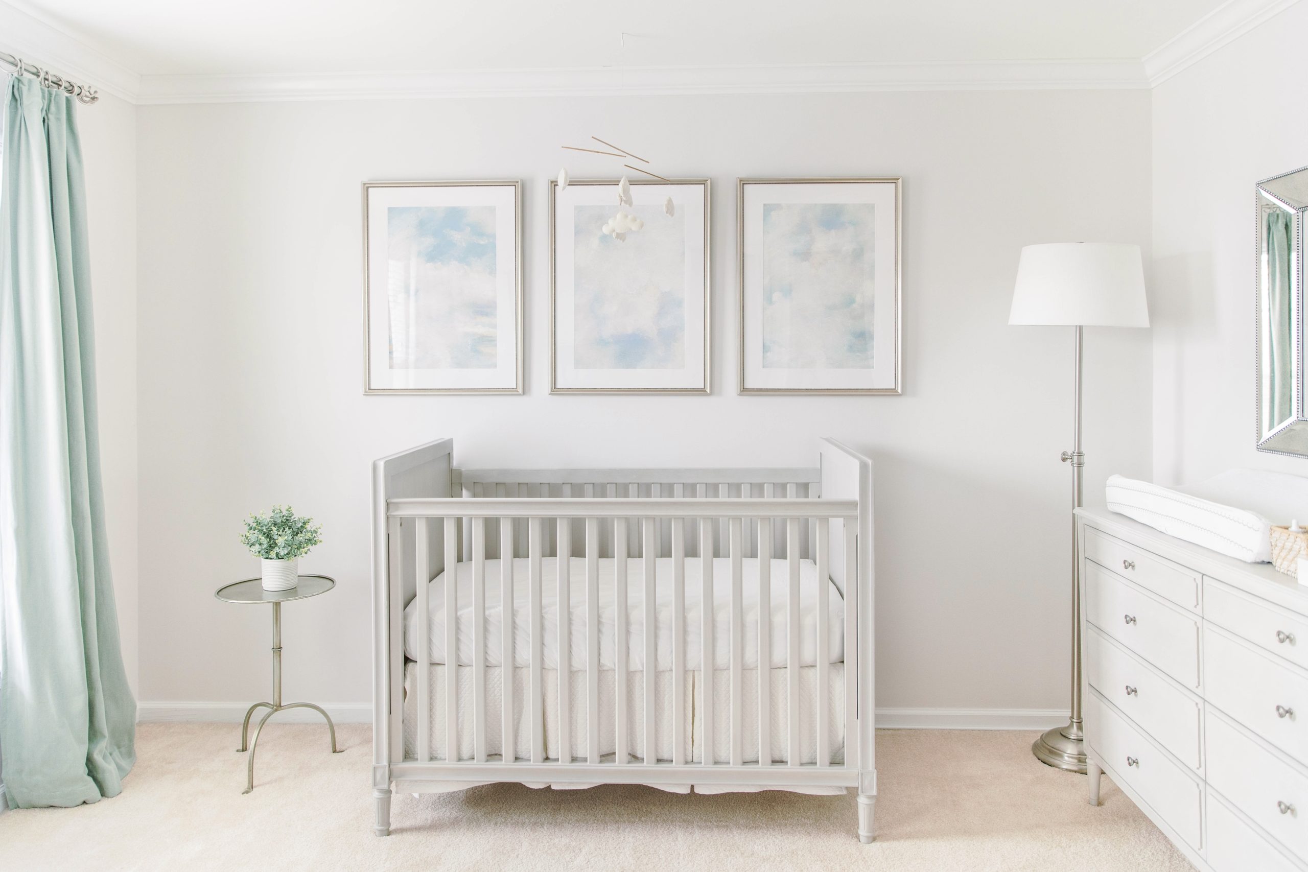 A subtle and elegant travel themed nursery with furniture from the Marcelle collection at Restoration Hardware.